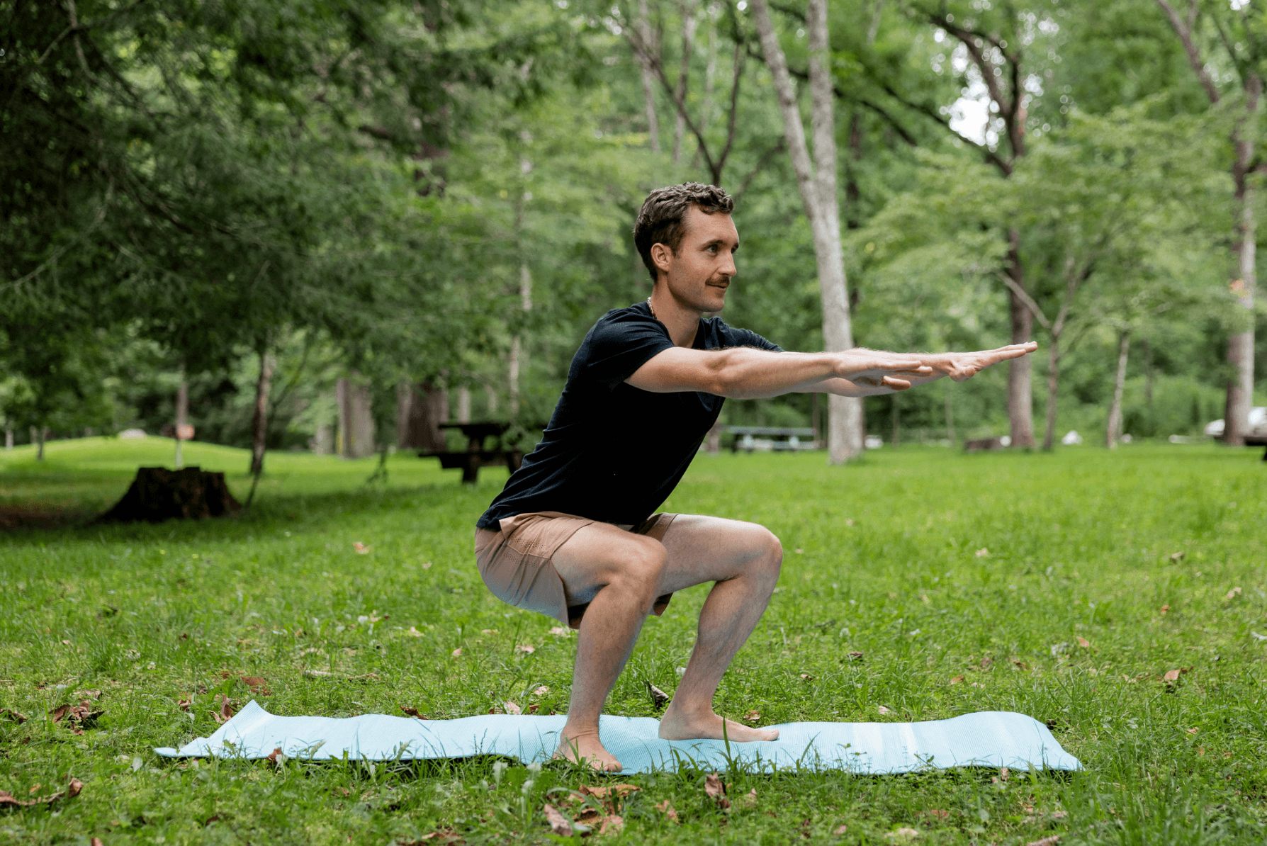 Dr. Cameron doing movement practice outdoors