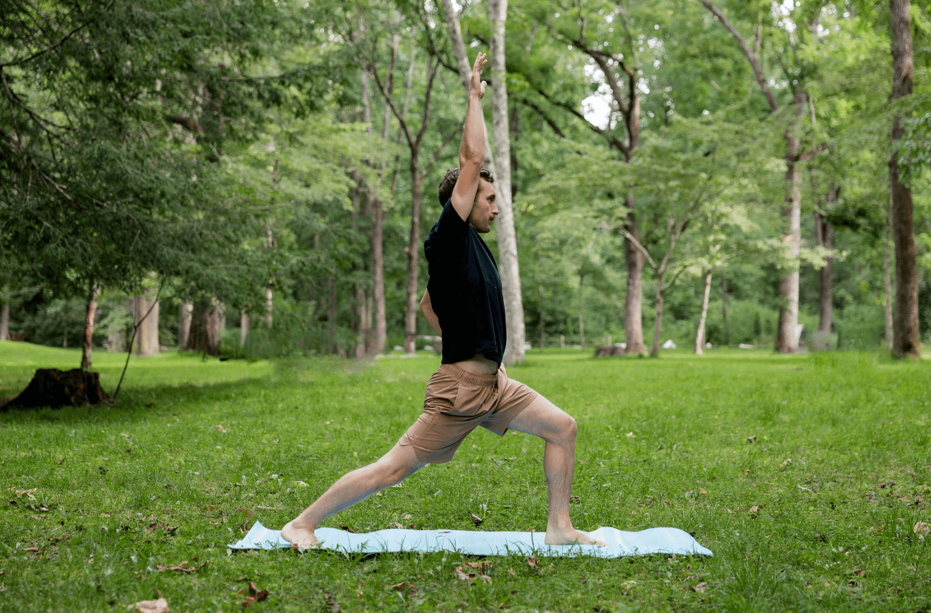 Dr. Cameron in warrior pose outdoors